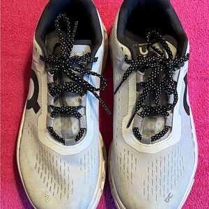 On Running Gray and Black Athletic Shoes